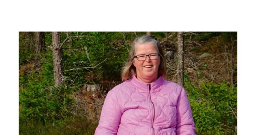 Bild på Anette Pettersson i en rosa jacka. Foto.