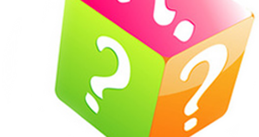 Tärning med frågetecken på varje sida och i färgerna grön,rosa och orange