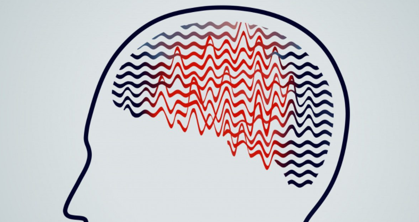 En illustration av en hjärna med vågor i.