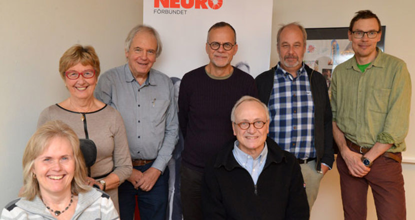 Sju personer ur förlikningskommittén. 